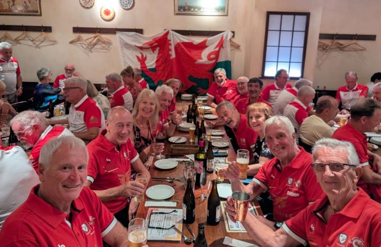 Micky joins his team-mates at their post-match meal